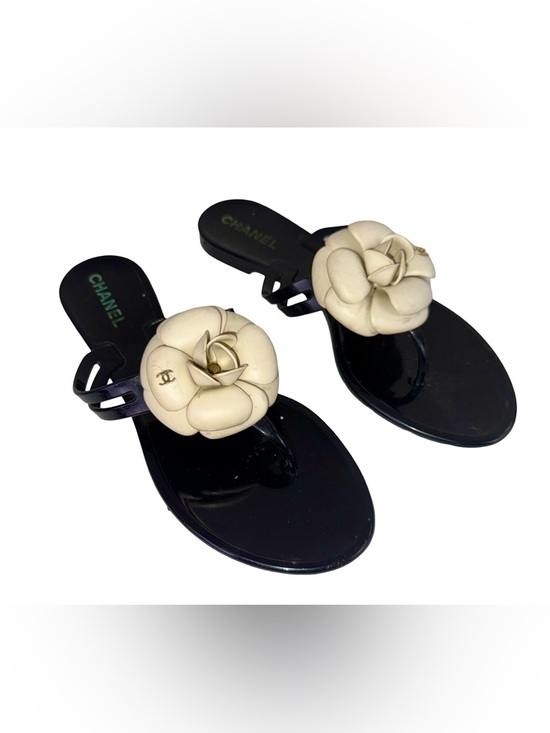CHANEL Shoes - CHANEL CAMELIA JELLY  SANDALS IN BLACK AND CREAM